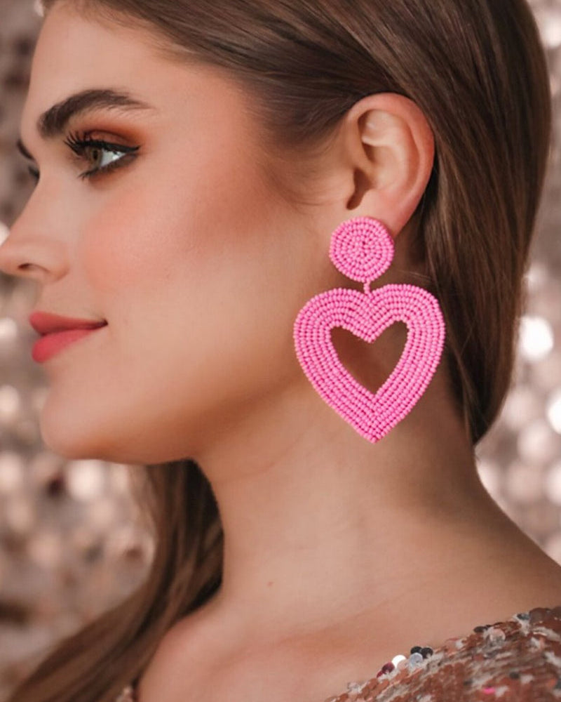 light pink beaded post stud earrings with matching beaded heart, a comfort replacement earring back, and a plastic disk stopper style in silver and gold