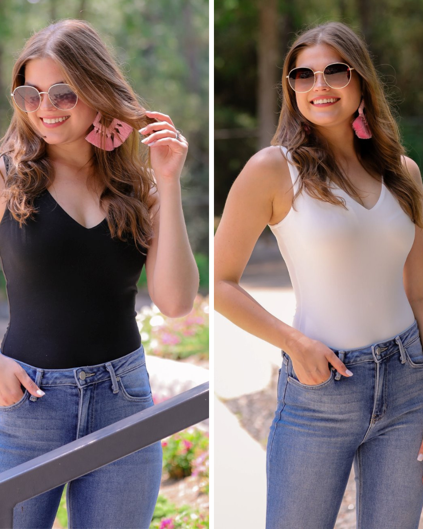 one-piece bodysuit made of soft and stretchy lightweight material with a v-neckline, sleeveless shoulder straps with a racerback fit, and a form-fitting silhouette that falls into a cheeky fit with a snap button closure in black and ivory