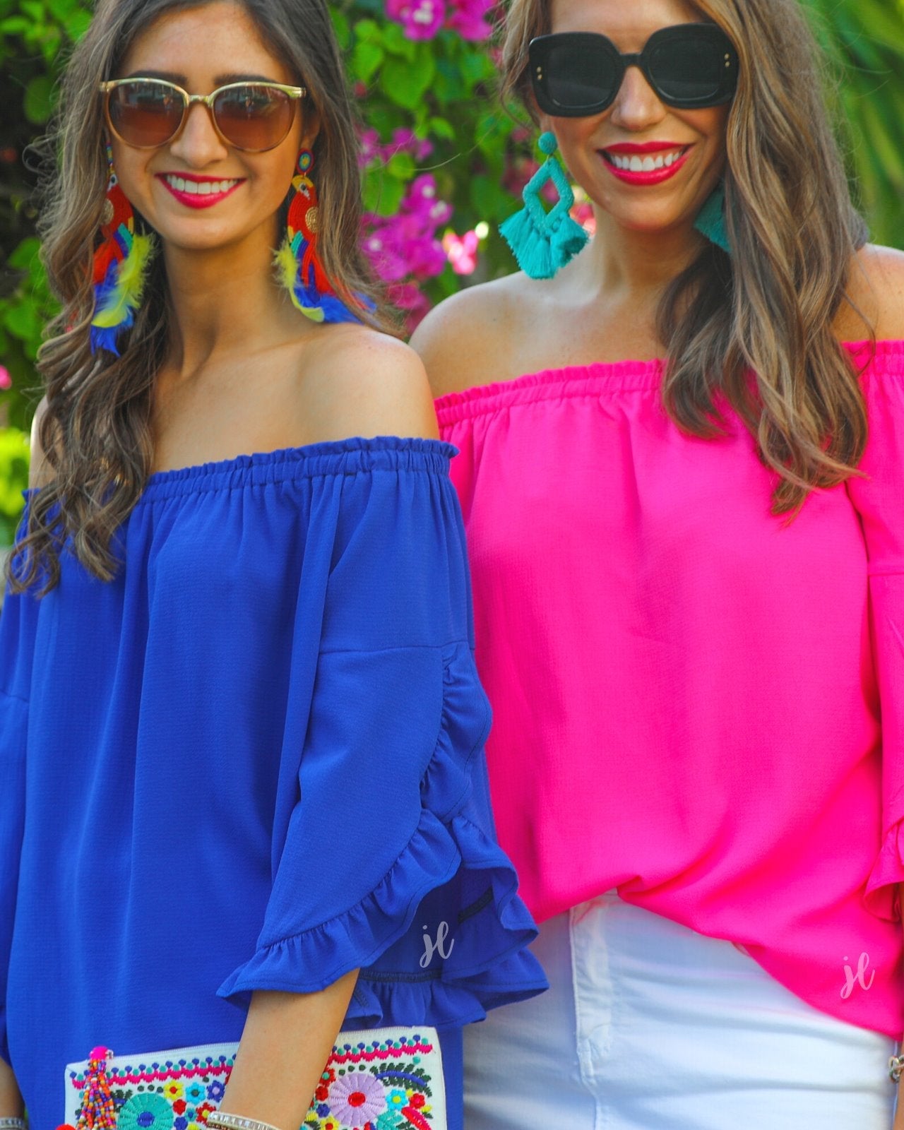 a flowy style top with a gathered scoop neckline that can be worn on or off the shoulder and three-quarter split ruffle sleeves in blue and pink