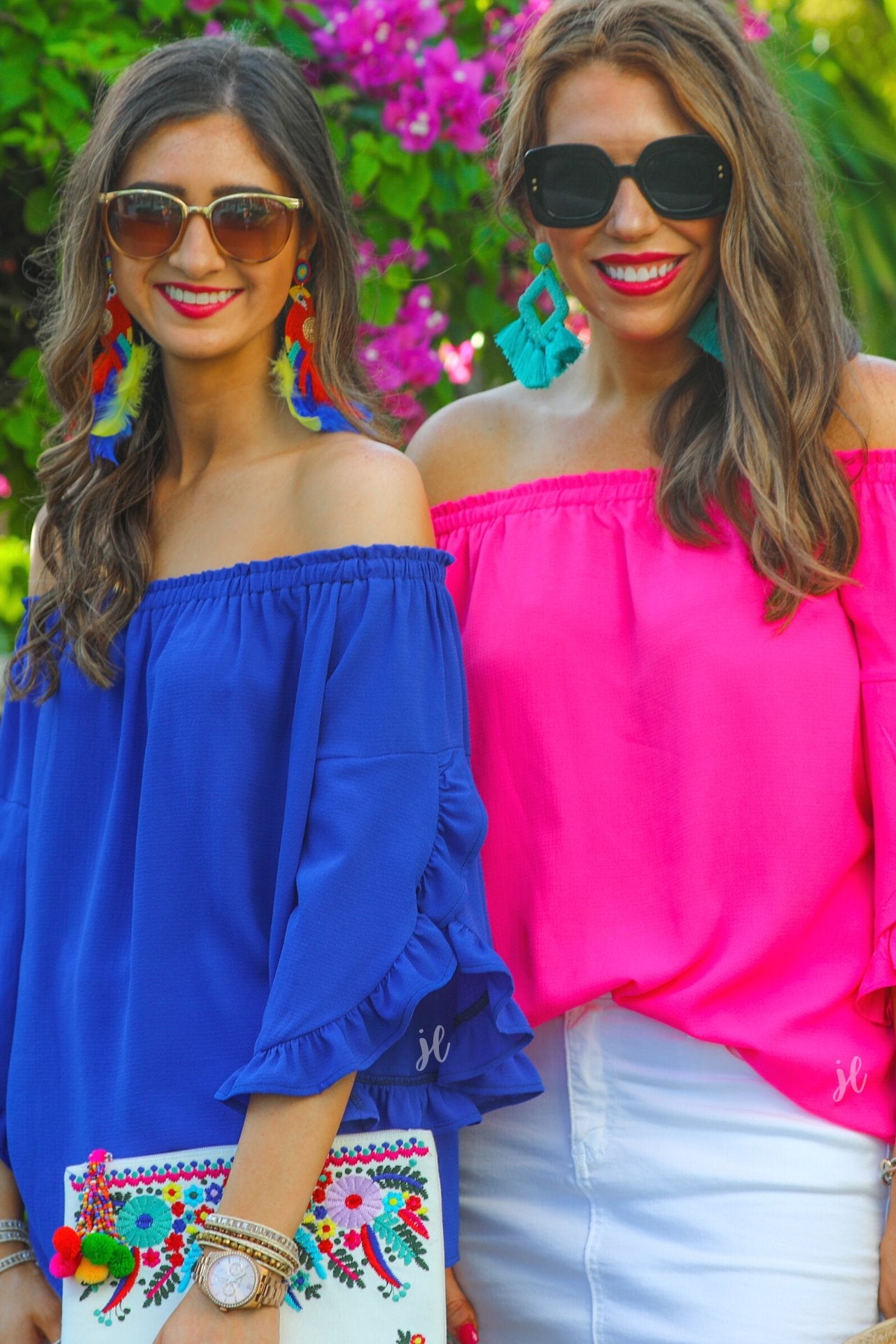 a flowy style top with a gathered scoop neckline that can be worn on or off the shoulder and three-quarter split ruffle sleeves in blue and pink