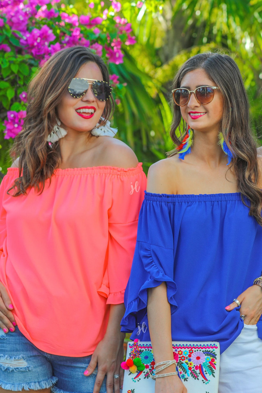 a flowy style top with a gathered scoop neckline that can be worn on or off the shoulder and three-quarter split ruffle sleeves in blue and coral