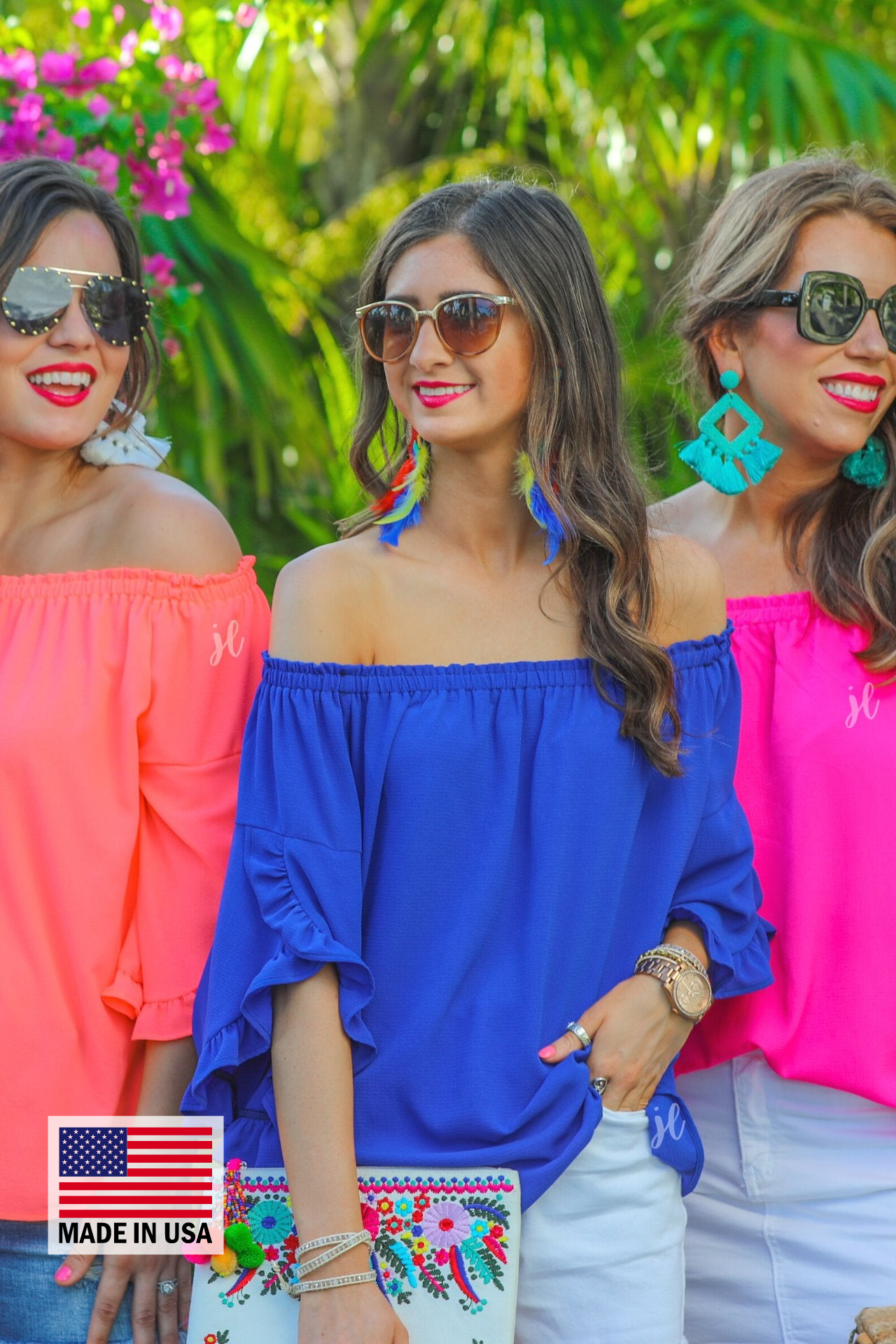 MADE IN USA a flowy style top with a gathered scoop neckline that can be worn on or off the shoulder and three-quarter split ruffle sleeves in blue, coral, and pink