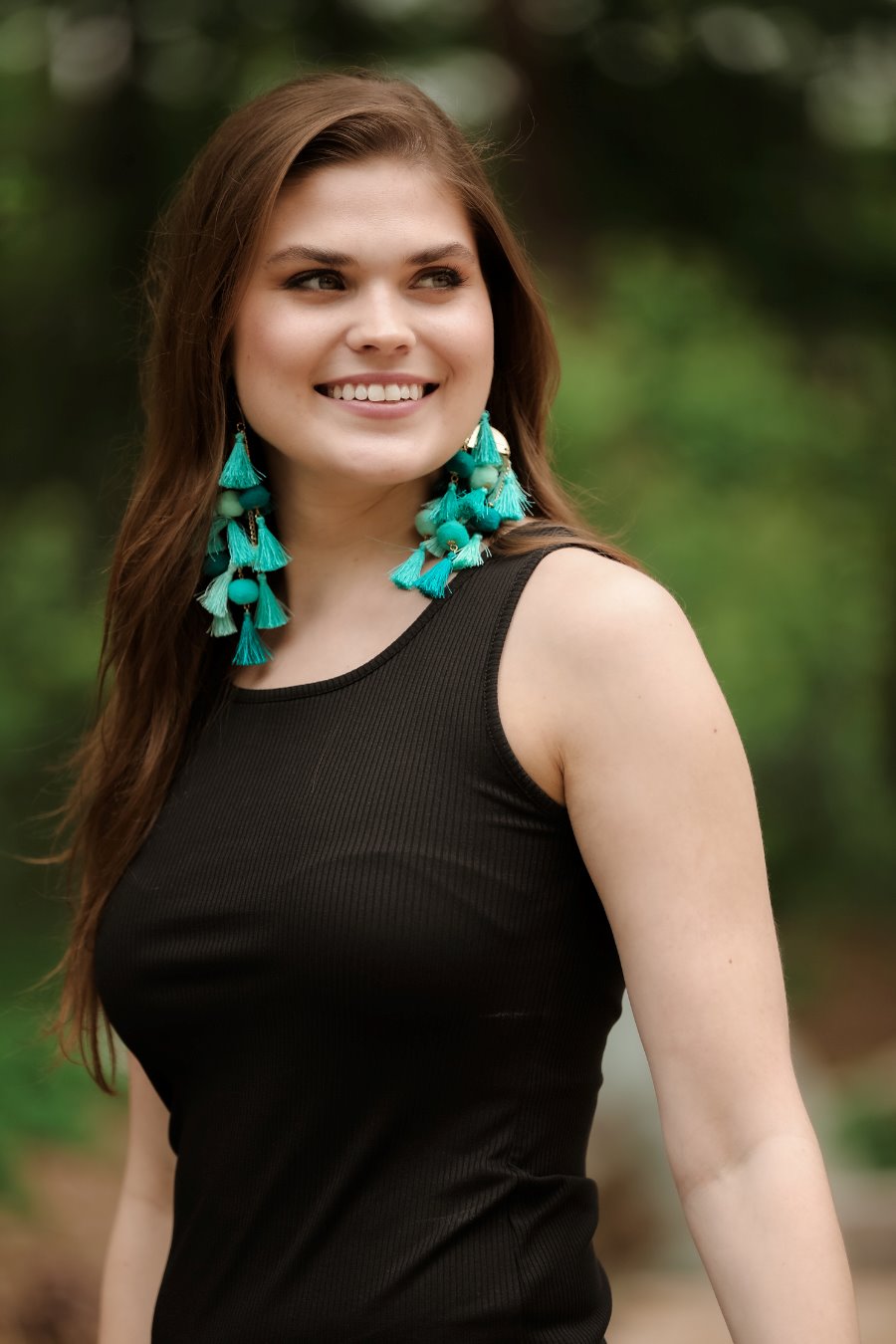 a black sleeveless tank top made of stretchy ribbed fabric