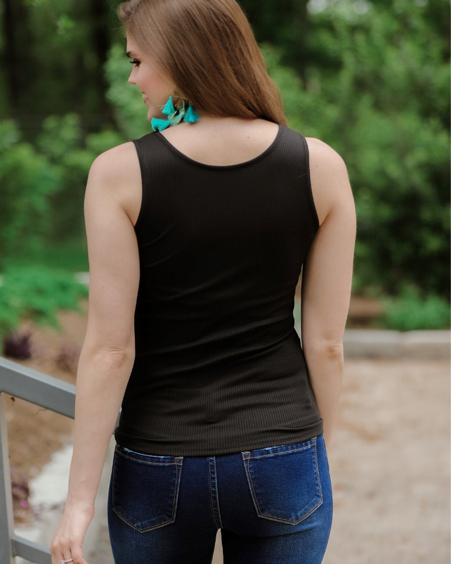 a black sleeveless tank top made of stretchy ribbed fabric