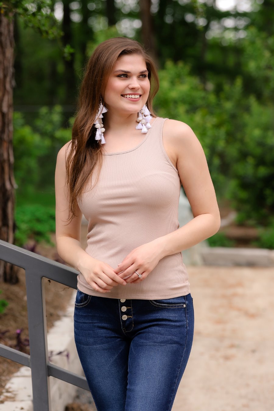a taupe sleeveless tank top made of stretchy ribbed fabric