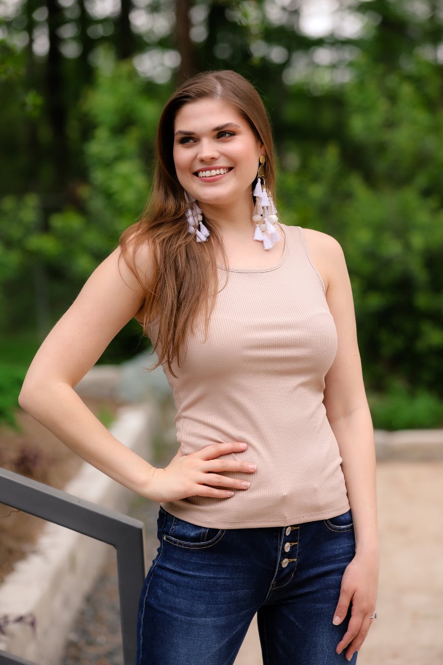 a taupe sleeveless tank top made of stretchy ribbed fabric