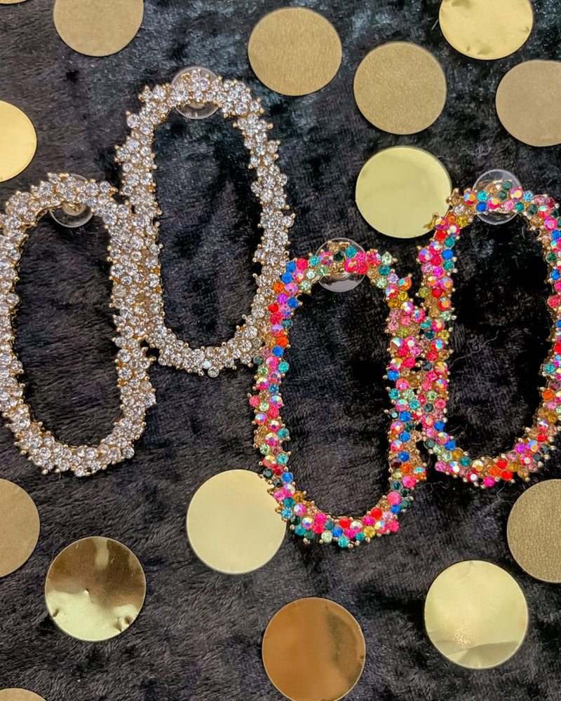 gold cubic zirconia earrings secured with a push backing in a long oval shape in crystal and multi