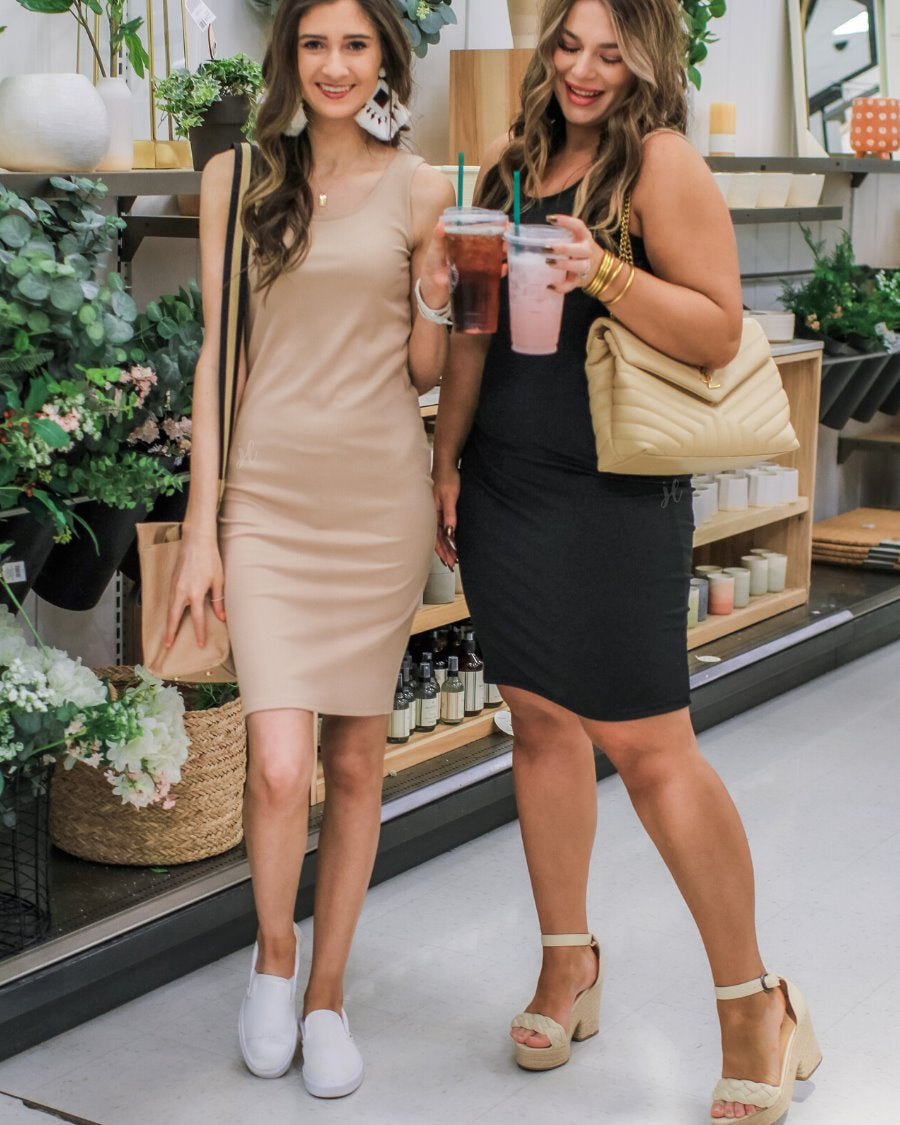 a lightweight midi bodycon dress with a flattering ribbed knit, a sleeveless silhouette, and a scoop neckline fabric in taupe