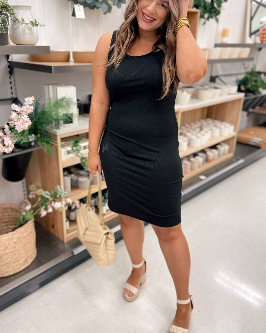 a lightweight midi bodycon dress with a flattering ribbed knit, a sleeveless silhouette, and a scoop neckline fabric in black