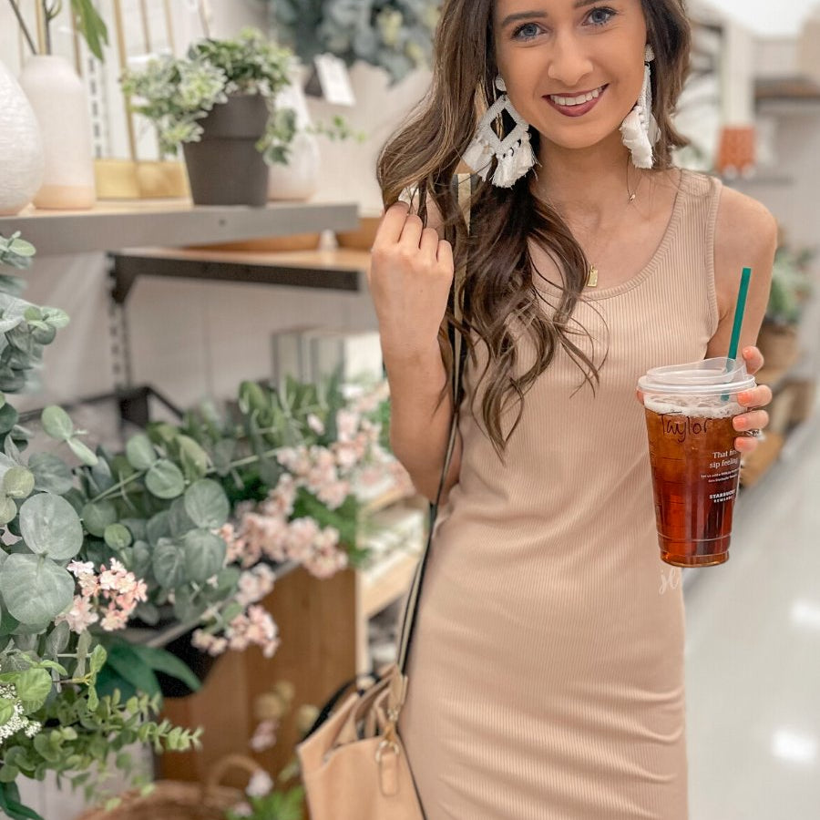 a lightweight midi bodycon dress with a flattering ribbed knit, a sleeveless silhouette, and a scoop neckline fabric in taupe