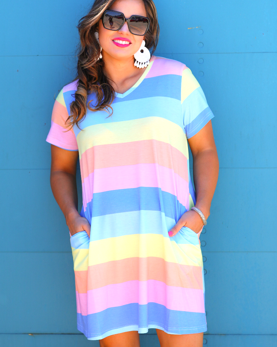 relaxed A-line fit short-sleeve dress made of super soft fabric with a V-neckline, straight hemline, and pockets