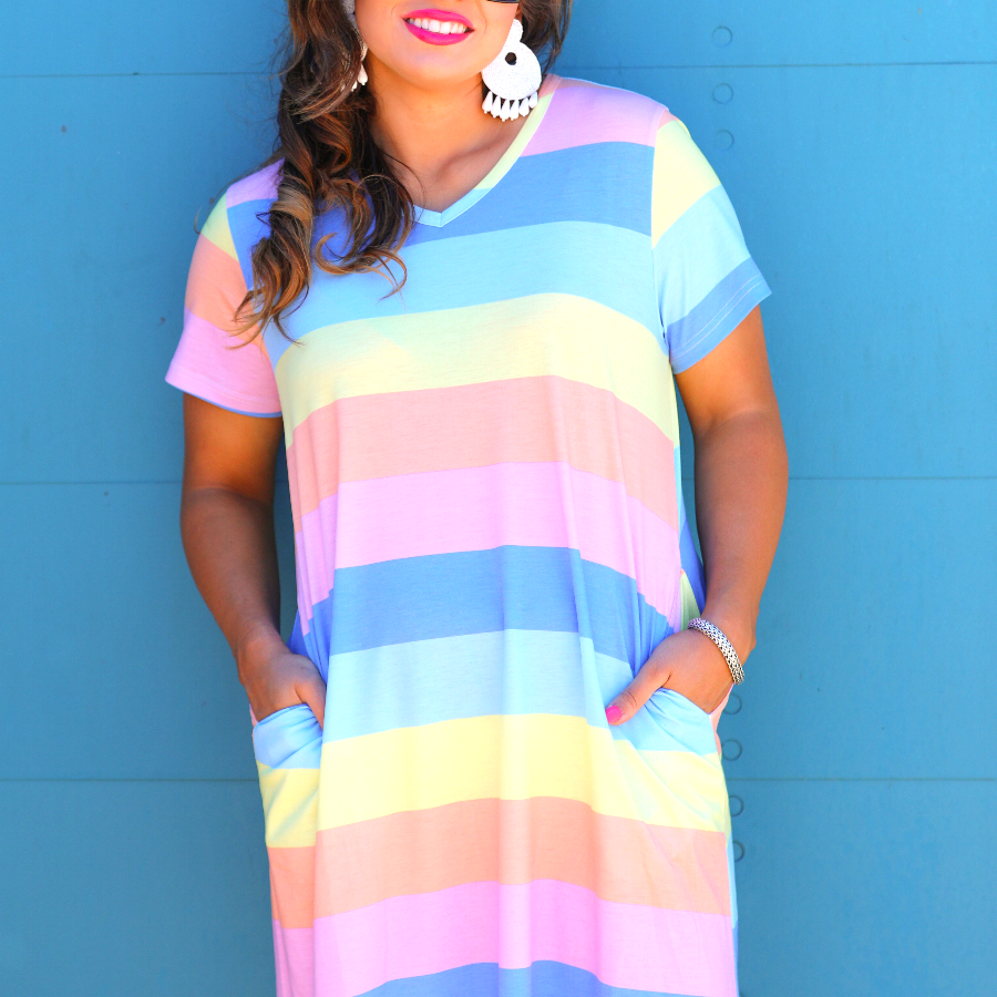 relaxed A-line fit short-sleeve dress made of super soft fabric with a V-neckline, straight hemline, and pockets