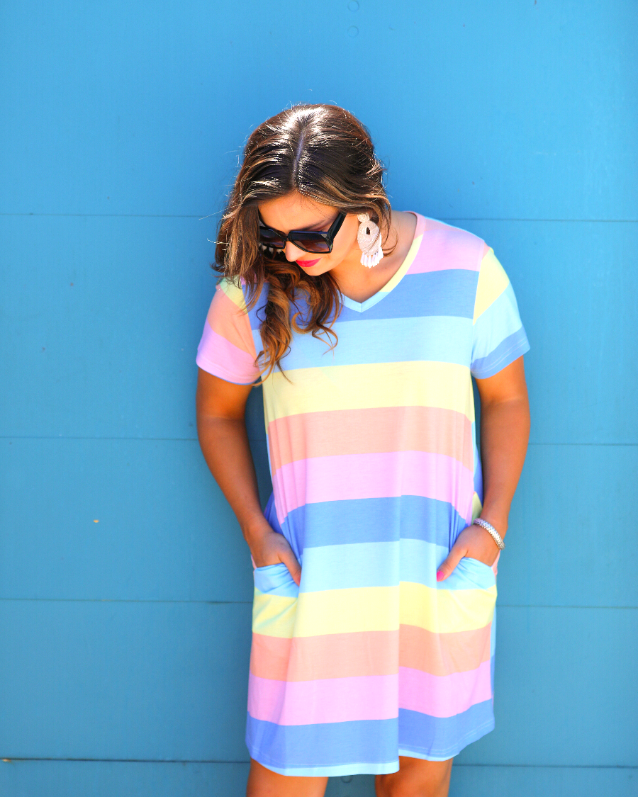 relaxed A-line fit short-sleeve dress made of super soft fabric with a V-neckline, straight hemline, and pockets