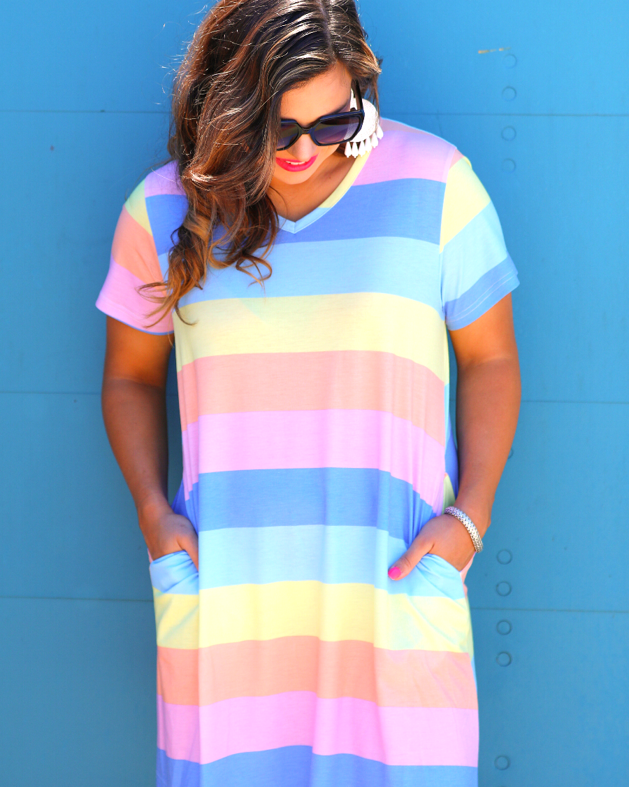 relaxed A-line fit short-sleeve dress made of super soft fabric with a V-neckline, straight hemline, and pockets