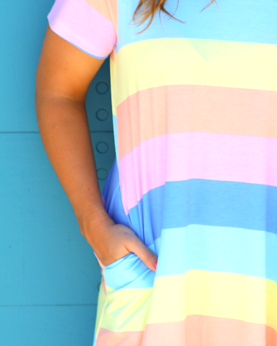 relaxed A-line fit short-sleeve dress made of super soft fabric with a V-neckline, straight hemline, and pockets