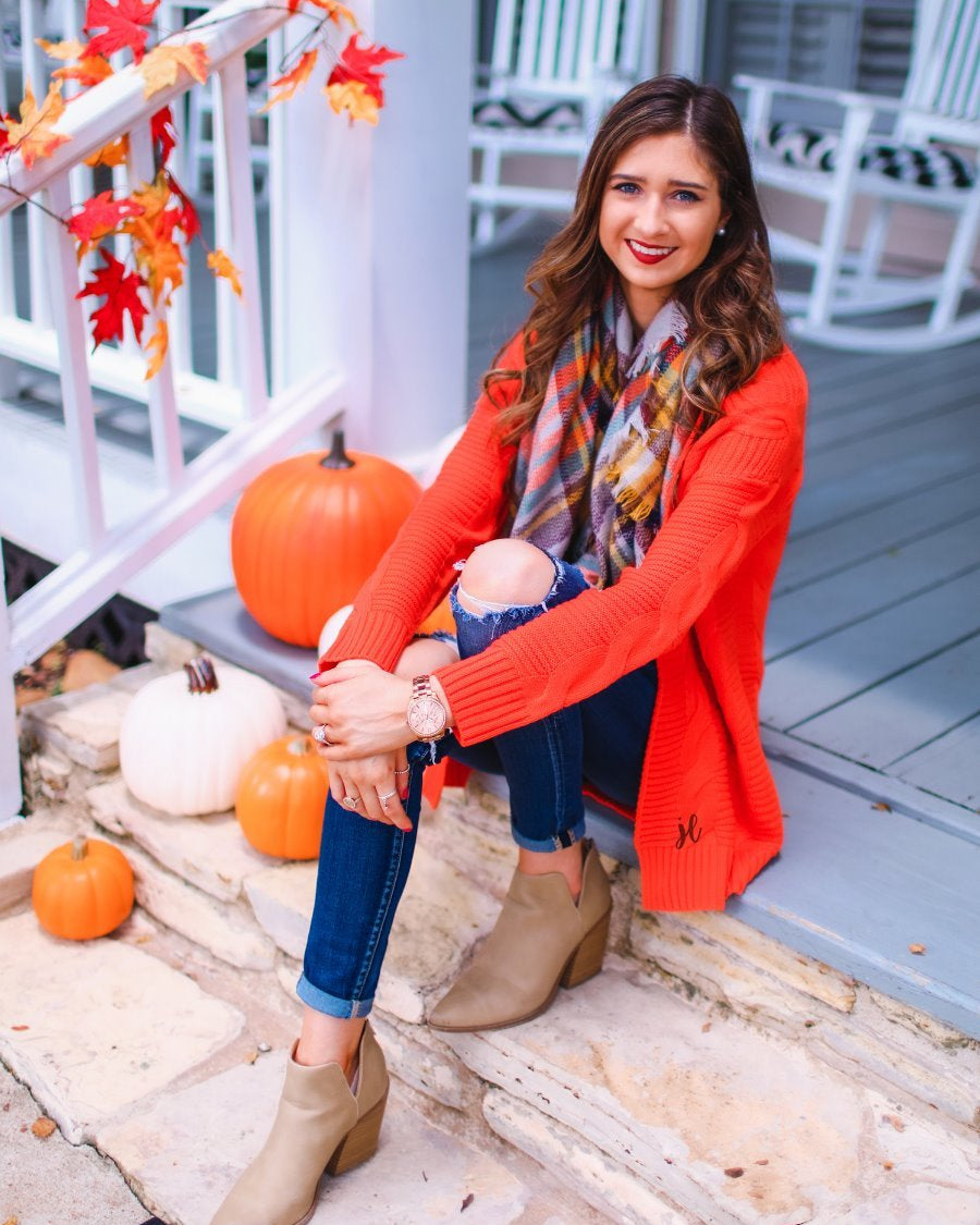 long-sleeve, open front cardigan crafted from cable knit textured fabric with a relaxed fit in orange