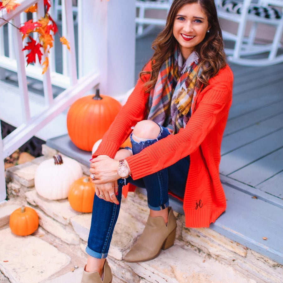 long-sleeve, open front cardigan crafted from cable knit textured fabric with a relaxed fit in orange