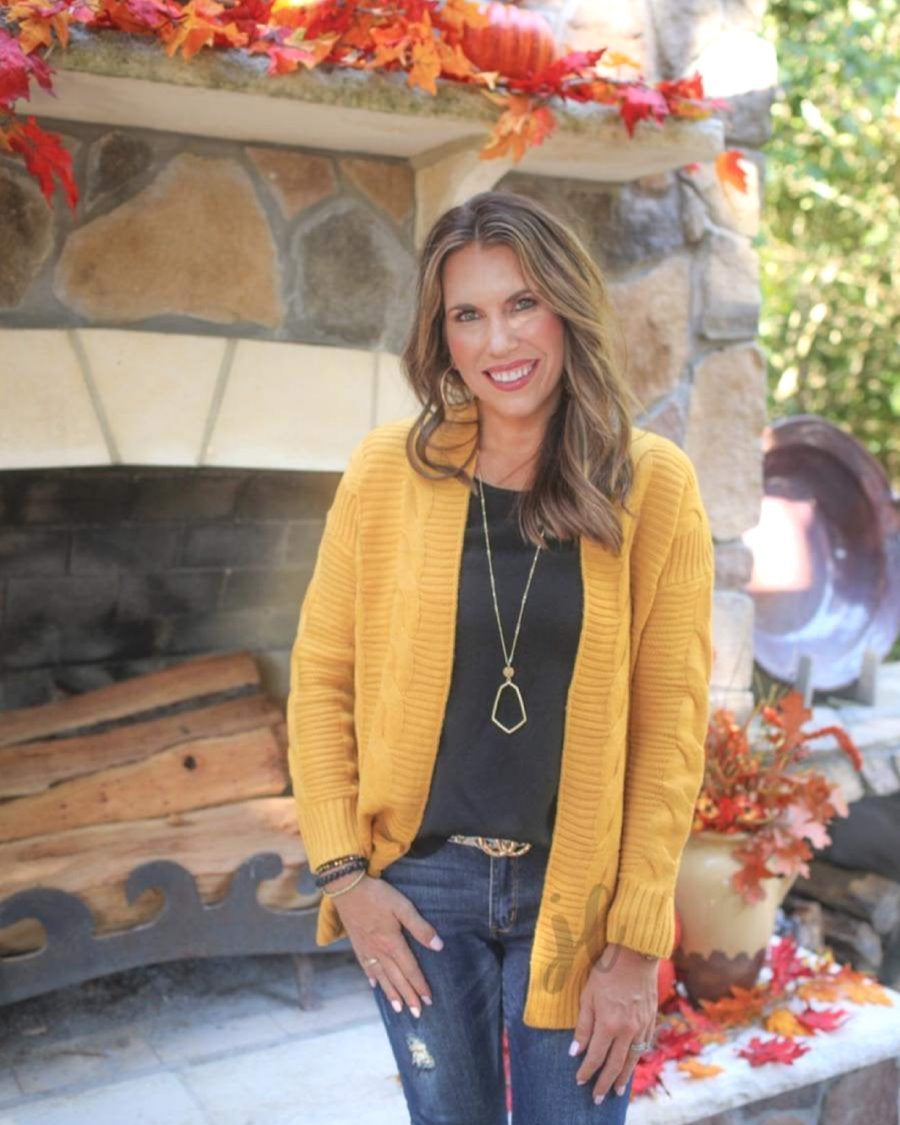 long-sleeve, open front cardigan crafted from cable knit textured fabric with a relaxed fit in mustard