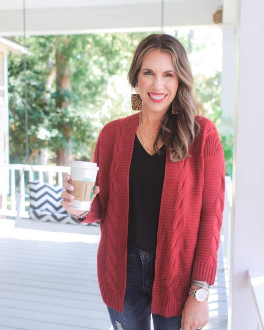 long-sleeve, open front cardigan crafted from cable knit textured fabric with a relaxed fit in cranberry
