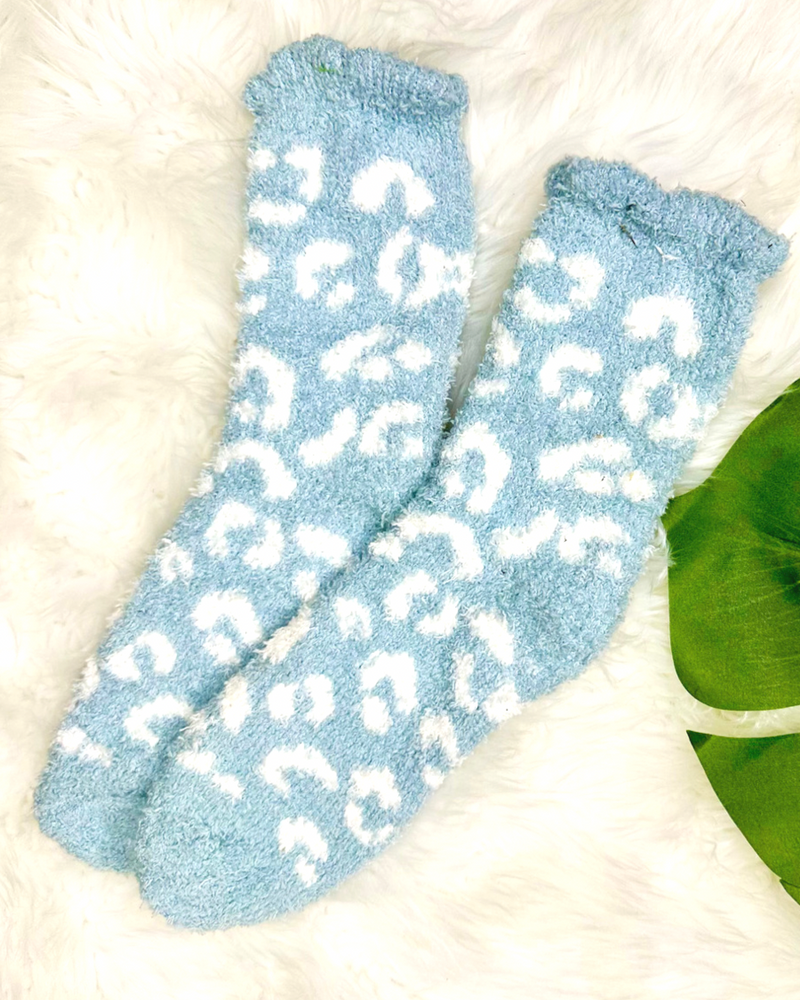 ultra-soft fuzzy socks with a playful animal print in blue