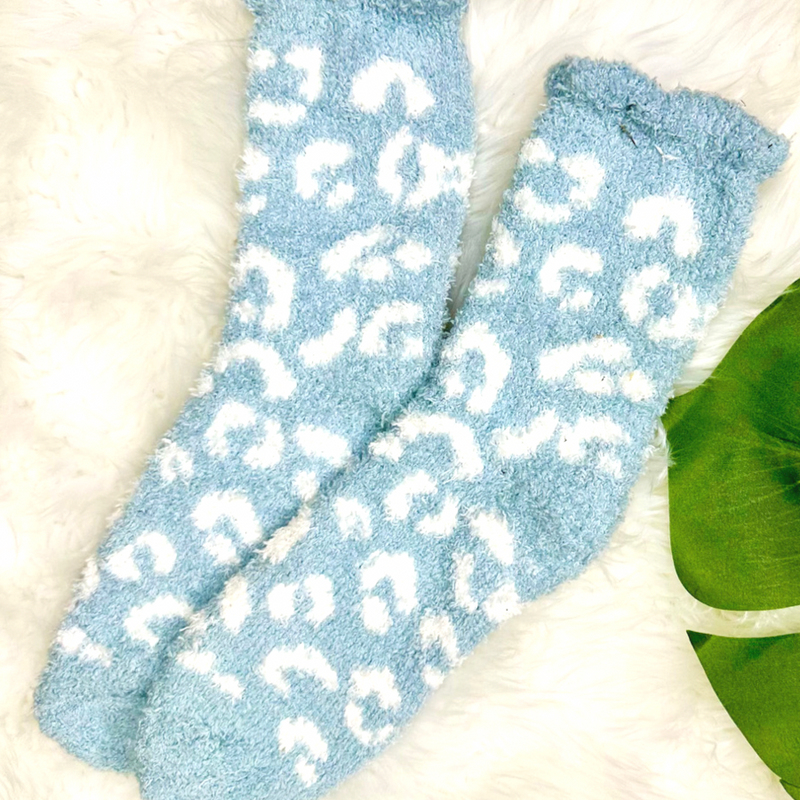 ultra-soft fuzzy socks with a playful animal print in blue