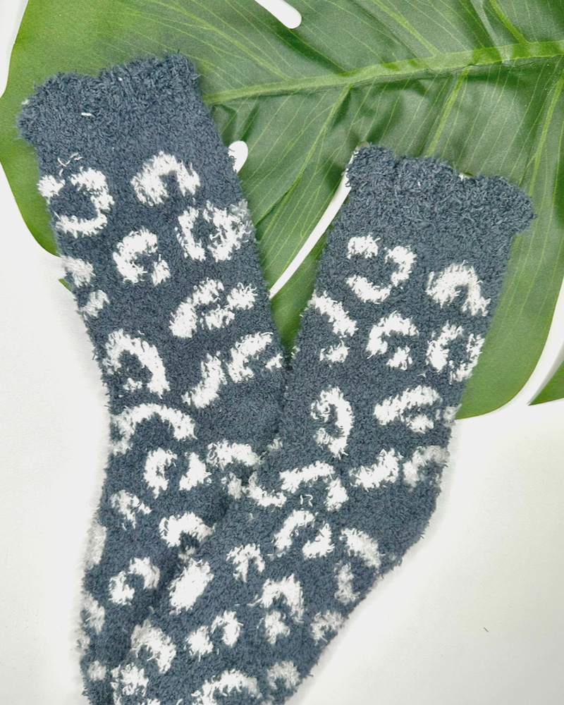 ultra-soft fuzzy socks with a playful animal print in grey