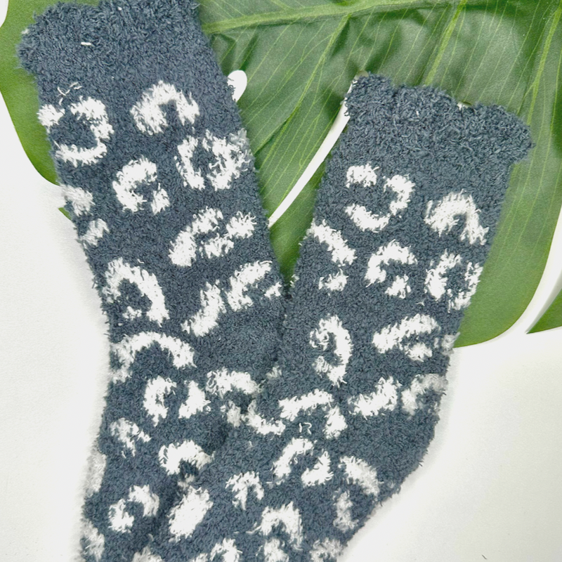 ultra-soft fuzzy socks with a playful animal print in grey