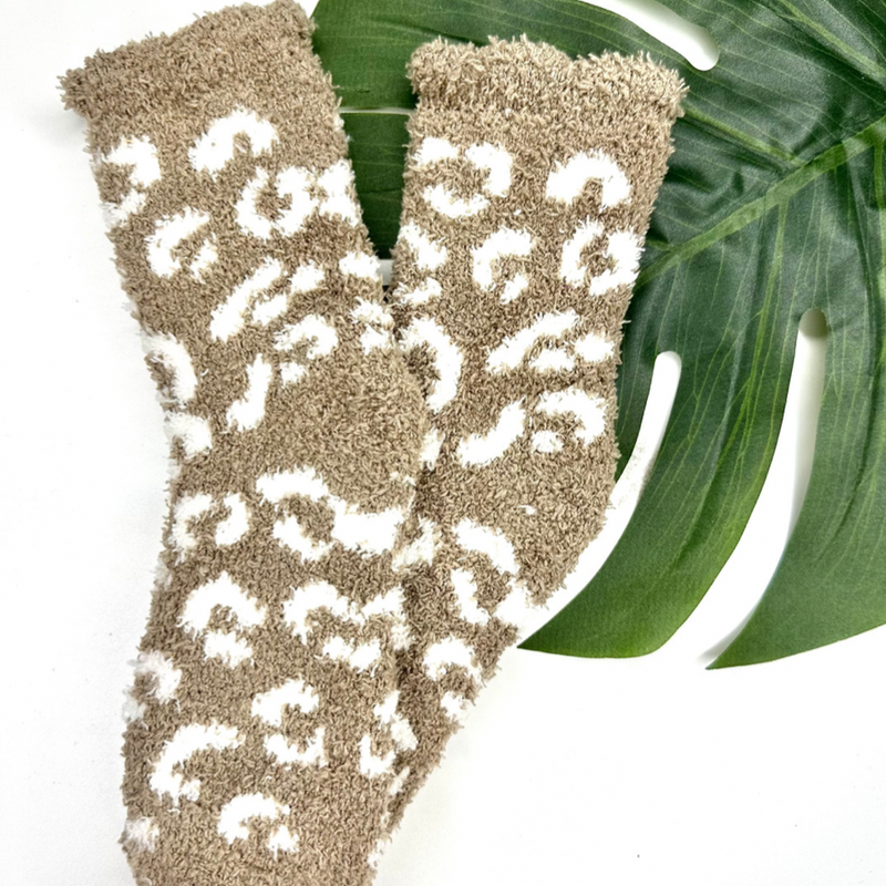 ultra-soft fuzzy socks with a playful animal print in tan