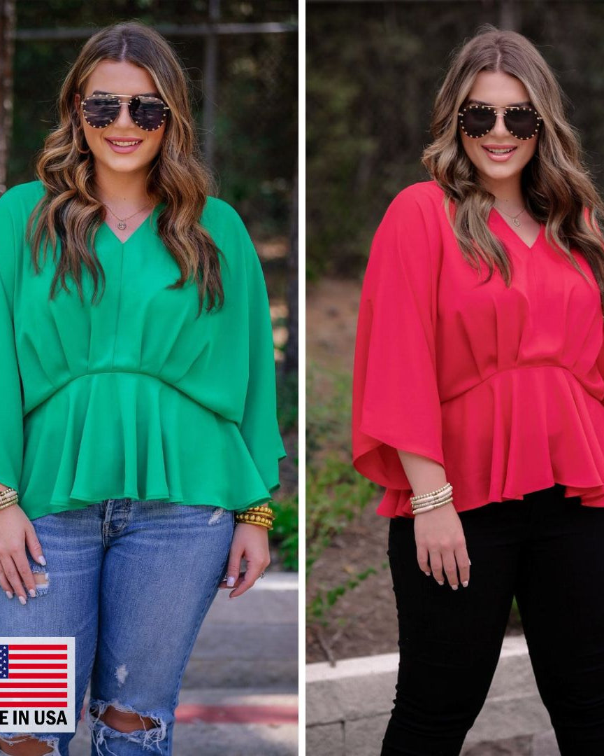 dolman long sleeves top with a plunging v-neckline and a gathered waistline in green and red