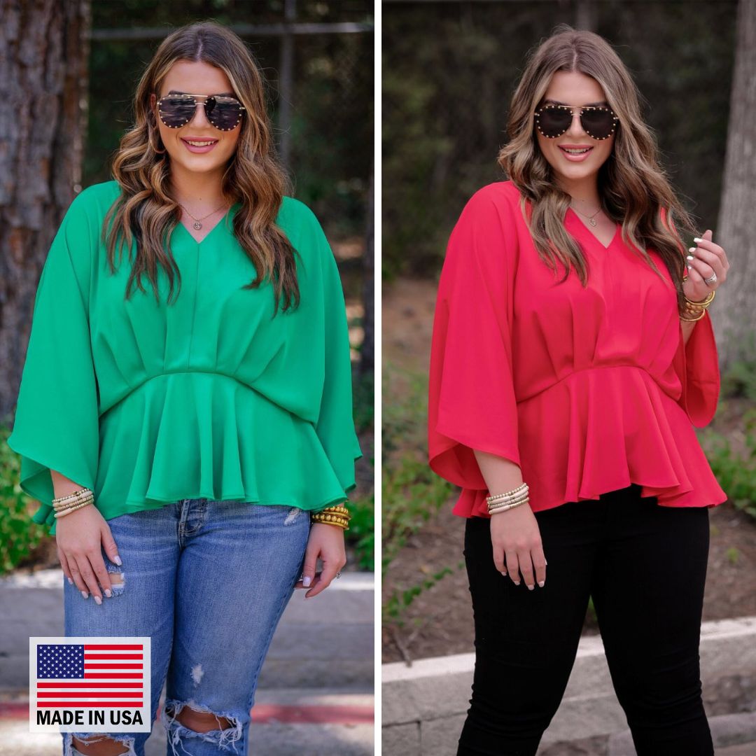 dolman long sleeves top with a plunging v-neckline and a gathered waistline in green and red