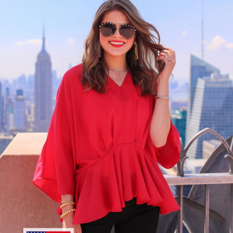 dolman long sleeves top with a plunging v-neckline and a gathered waistline in red