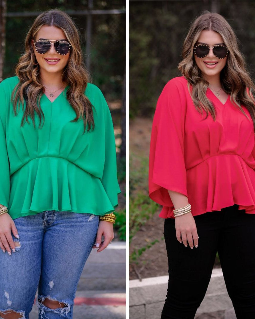 dolman long sleeves top with a plunging v-neckline and a gathered waistline in green and red