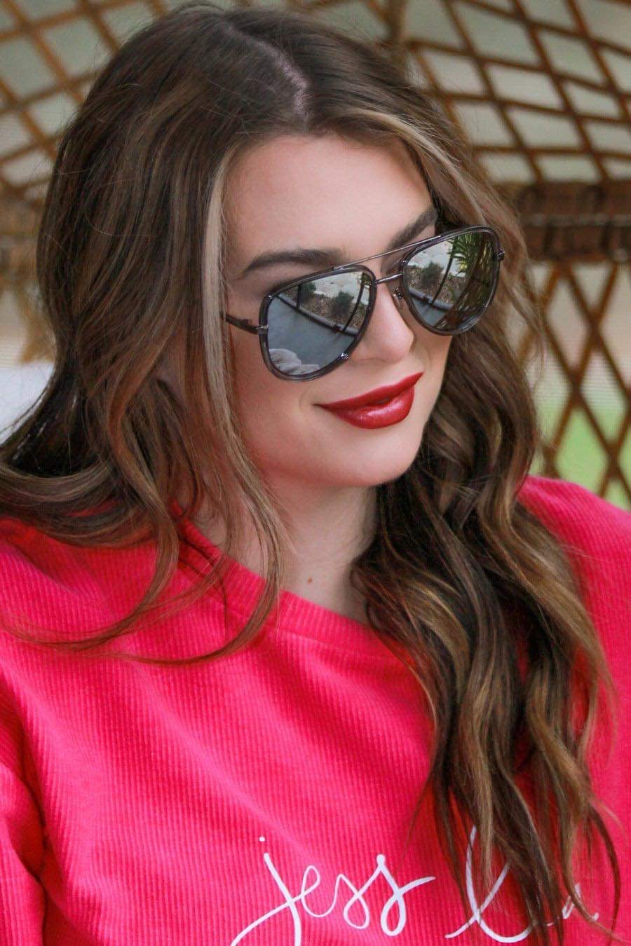 silver aviator sunglasses with thin round wireframes, tinted lenses, UV protection, and brand name detail (on both the temple and the complimentary black pouch)