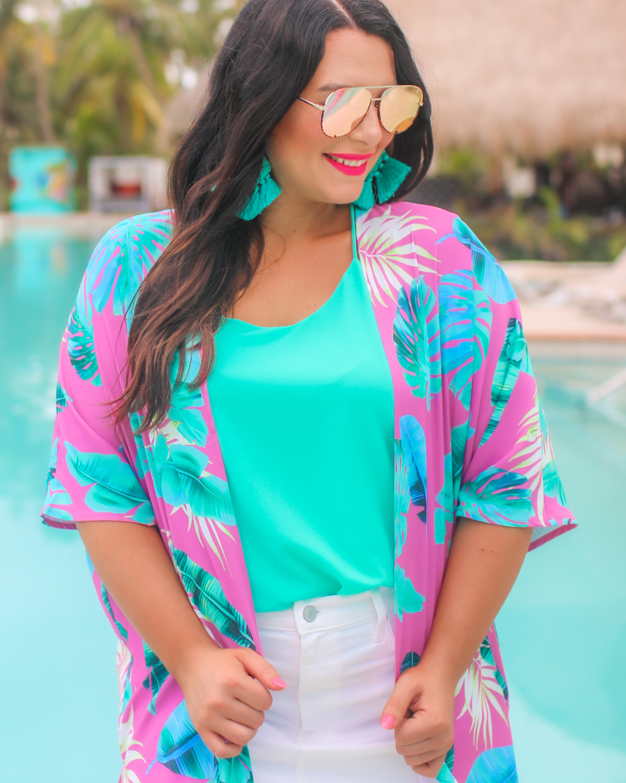 pink aviator sunglasses with tinted lenses, round wireframes with matching brow bar, leopard-patterned accents, UV protection, and brand detail (on both the temple and the complimentary black pouch)