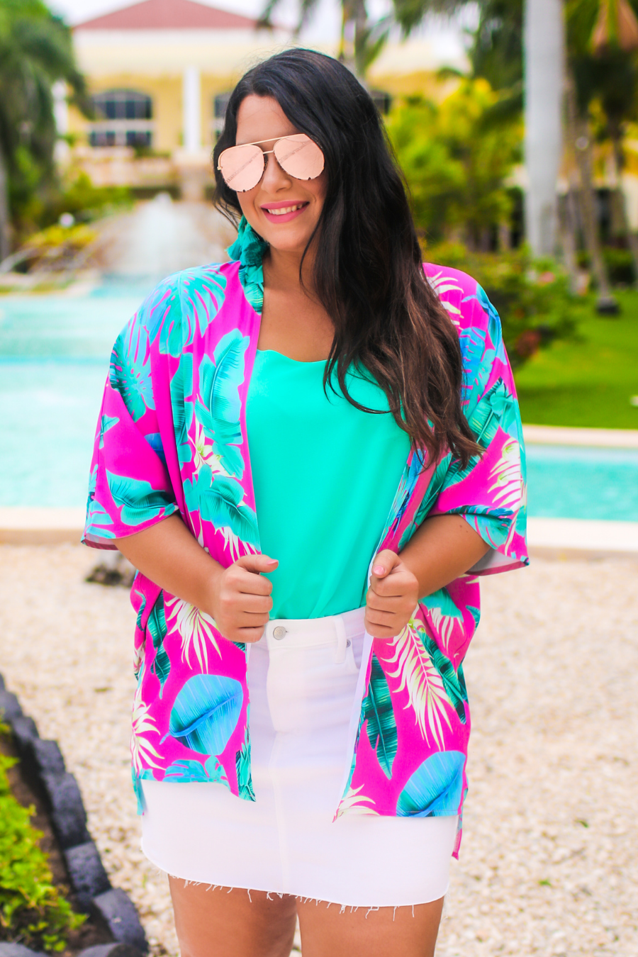 pink aviator sunglasses with tinted lenses, round wireframes with matching brow bar, leopard-patterned accents, UV protection, and brand detail (on both the temple and the complimentary black pouch)