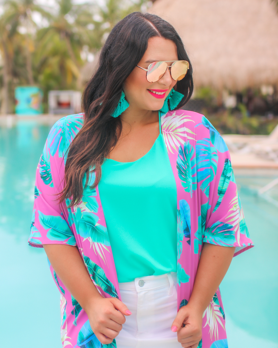 pink aviator sunglasses with tinted lenses, round wireframes with matching brow bar, leopard-patterned accents, UV protection, and brand detail (on both the temple and the complimentary black pouch)