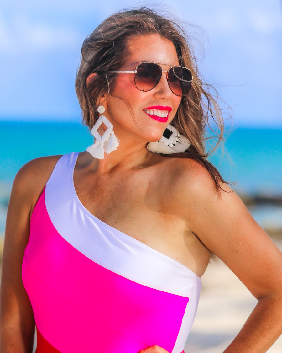 brown aviator sunglasses with tinted lenses, round wireframes with matching brow bar, leopard-patterned accents, UV protection, and brand detail (on both the temple and the complimentary black pouch)