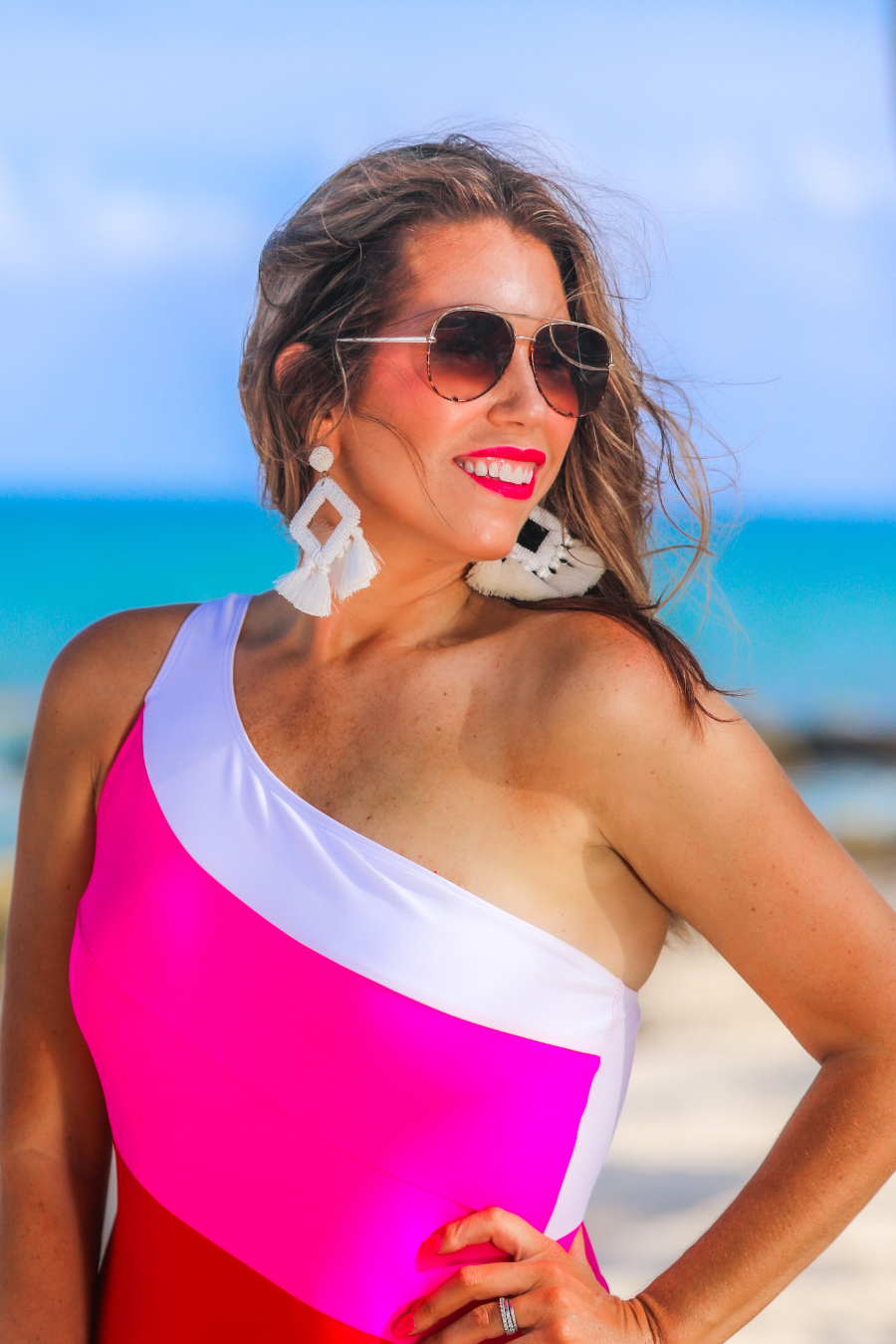 brown aviator sunglasses with tinted lenses, round wireframes with matching brow bar, leopard-patterned accents, UV protection, and brand detail (on both the temple and the complimentary black pouch)