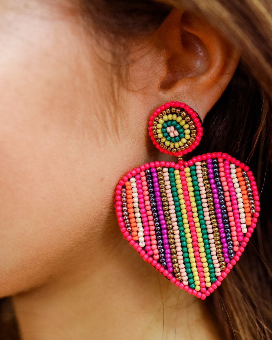 heart-shaped stud earrings with double-sided multicolored beading, a comfort replacement earring back, and plastic disk stopper style in silver and gold