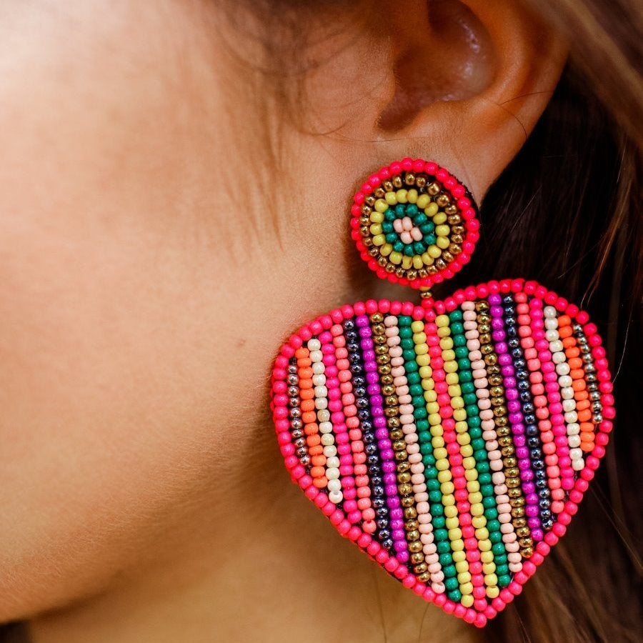heart-shaped stud earrings with double-sided multicolored beading, a comfort replacement earring back, and plastic disk stopper style in silver and gold