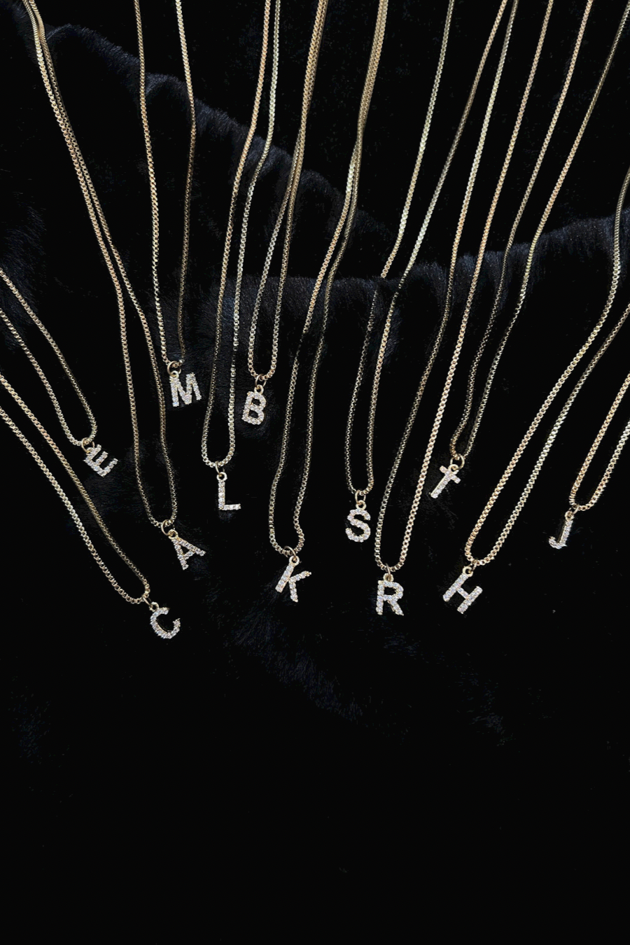 gold chain necklace with rhinestone-studded initial charm in A, B, C, E, H, J, K, L, M, R, S, and T
