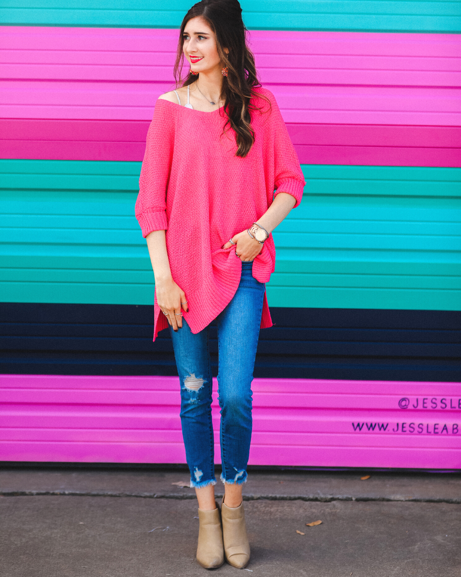 lightweight oversized tunic made of loosely knitted material with three-quarter sleeves, a hi-lo hemline, side slits, and a relaxed drape for easy, all-day wear in pink