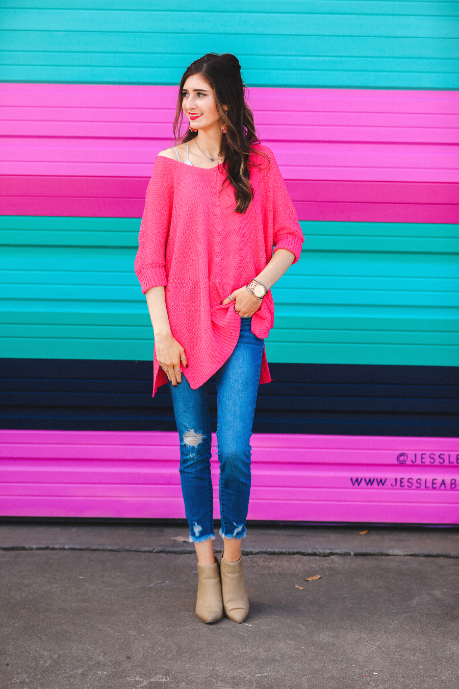 lightweight oversized tunic made of loosely knitted material with three-quarter sleeves, a hi-lo hemline, side slits, and a relaxed drape for easy, all-day wear in pink