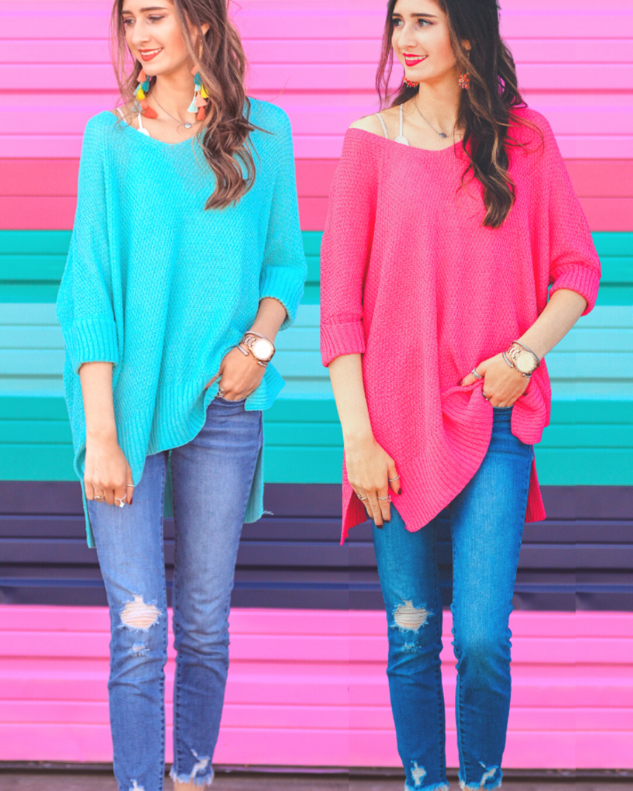 lightweight oversized tunic made of loosely knitted material with three-quarter sleeves, a hi-lo hemline, side slits, and a relaxed drape for easy, all-day wear in aqua and pink