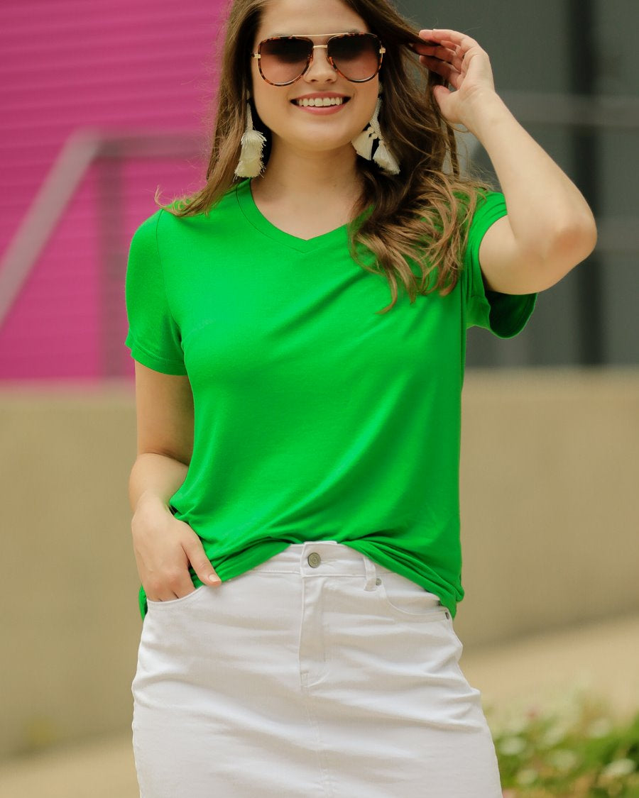 short-sleeved tee made of soft, breathable fabric with a V-neckline and a rounded hemline in kelly green