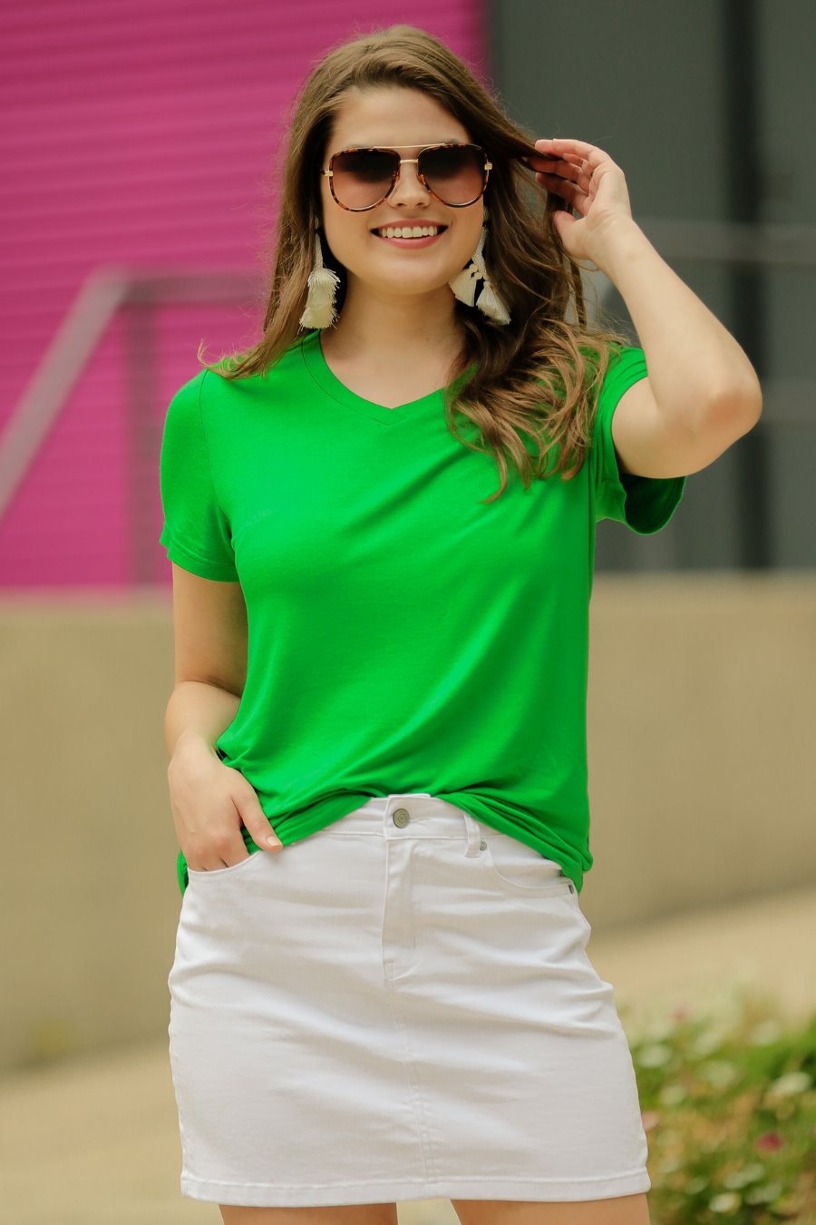 short-sleeved tee made of soft, breathable fabric with a V-neckline and a rounded hemline in kelly green