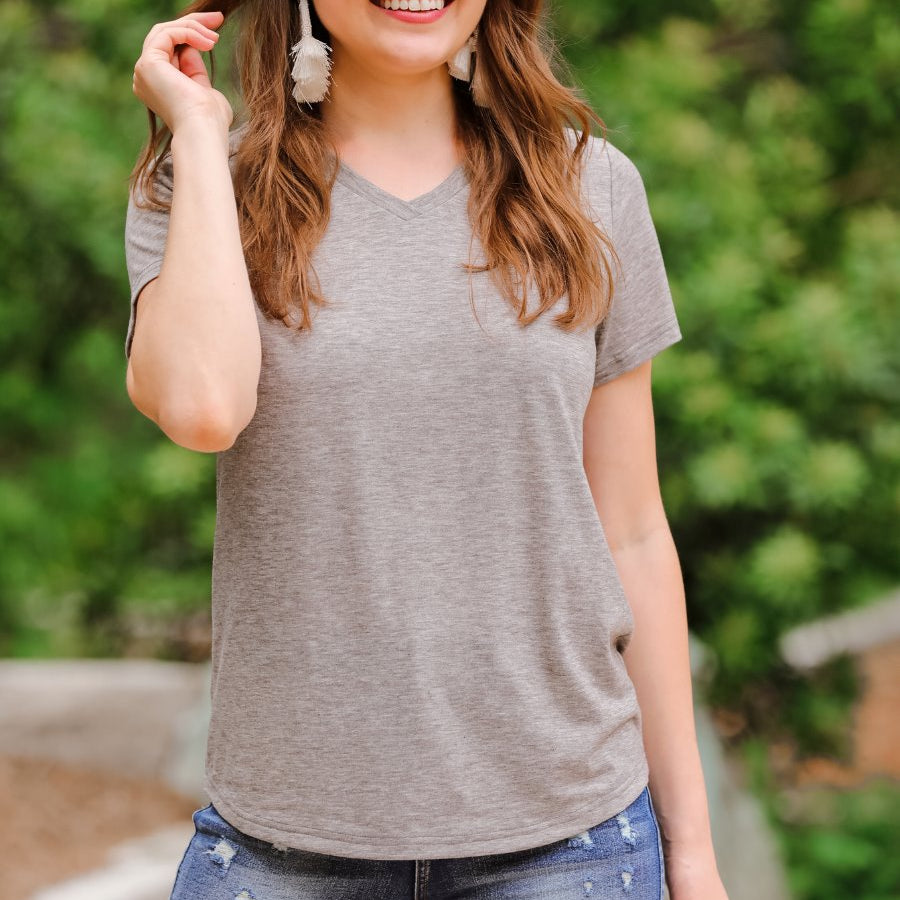 short-sleeved tee made of soft, breathable fabric with a V-neckline and a rounded hemline in heathered grey