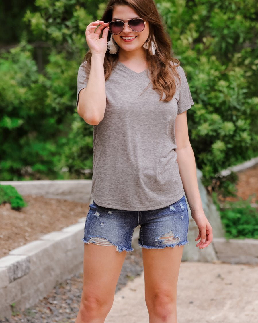 short-sleeved tee made of soft, breathable fabric with a V-neckline and a rounded hemline in heathered grey