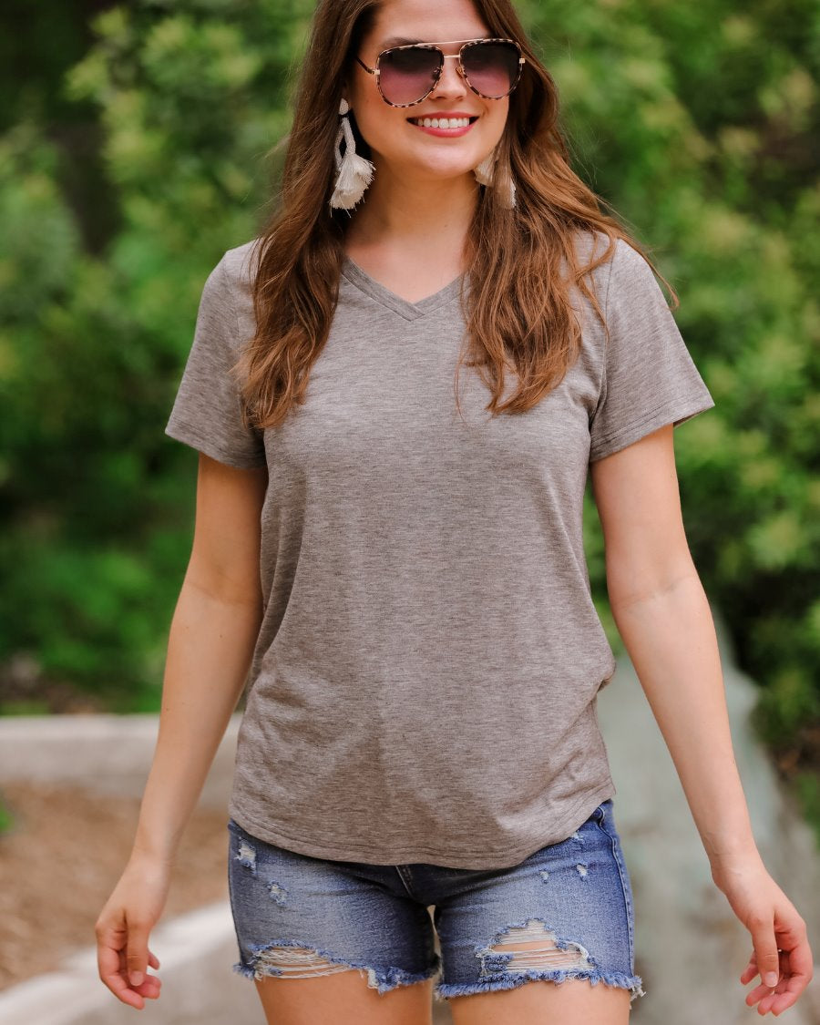 short-sleeved tee made of soft, breathable fabric with a V-neckline and a rounded hemline in heathered grey