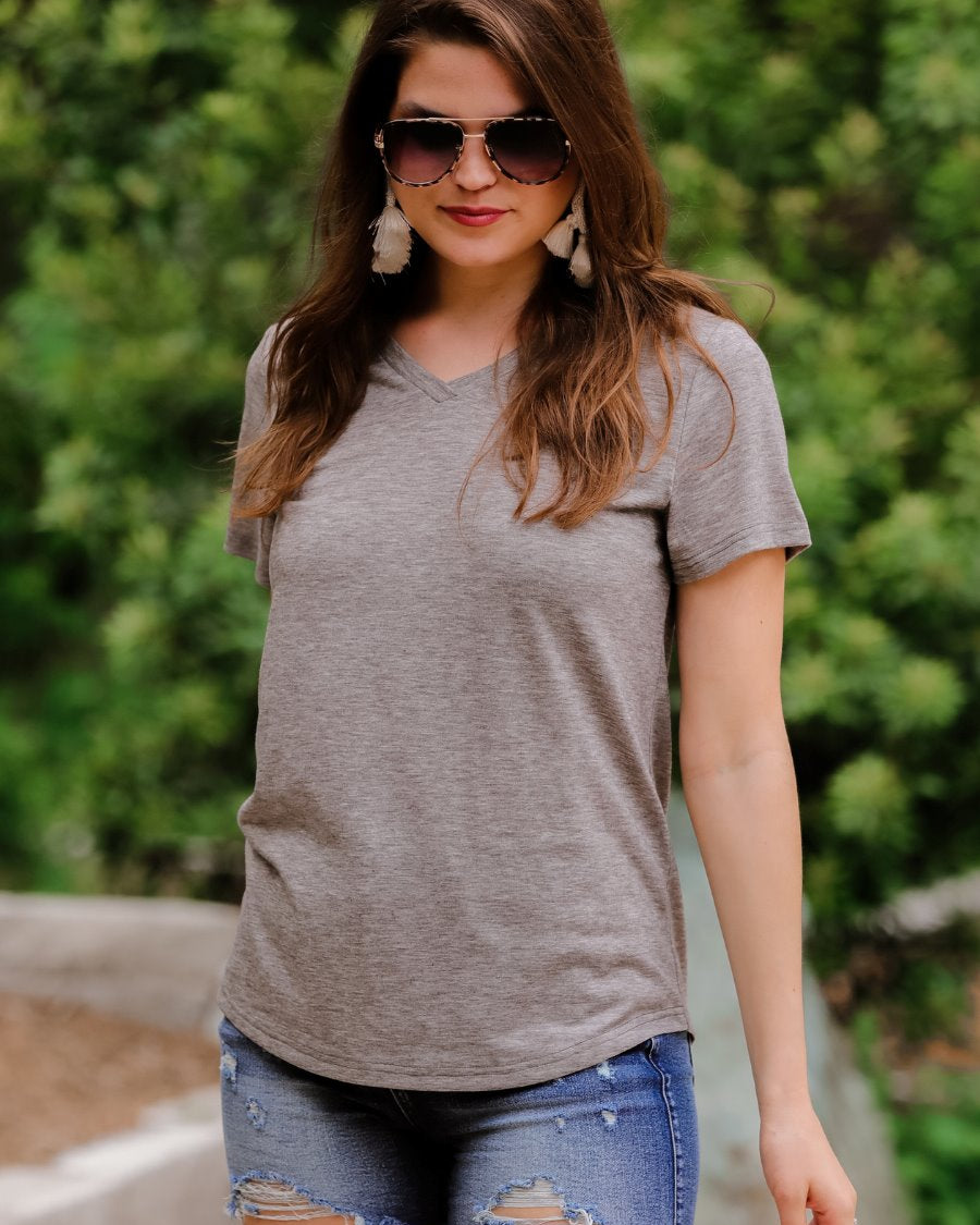 short-sleeved tee made of soft, breathable fabric with a V-neckline and a rounded hemline in heathered grey